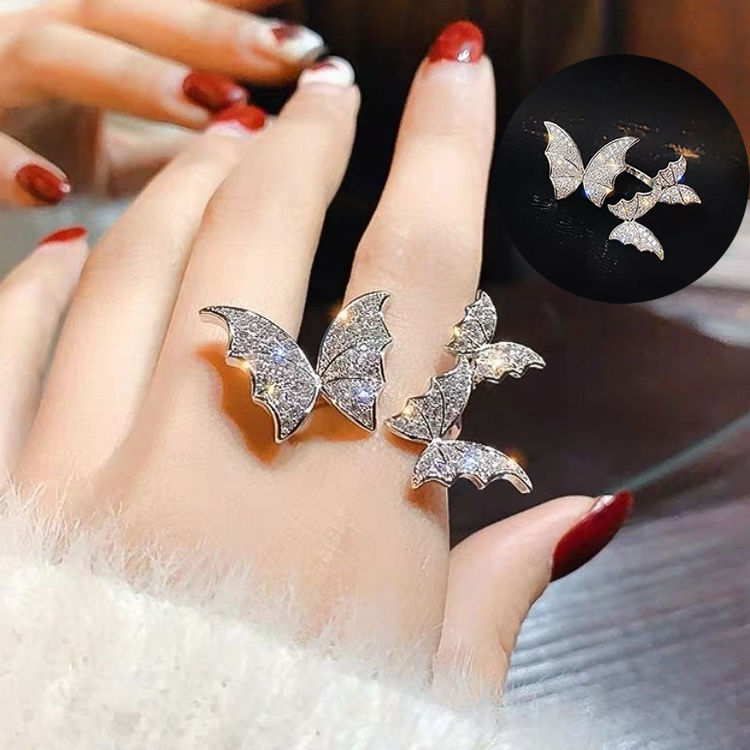 Gem engraved butterfly ring