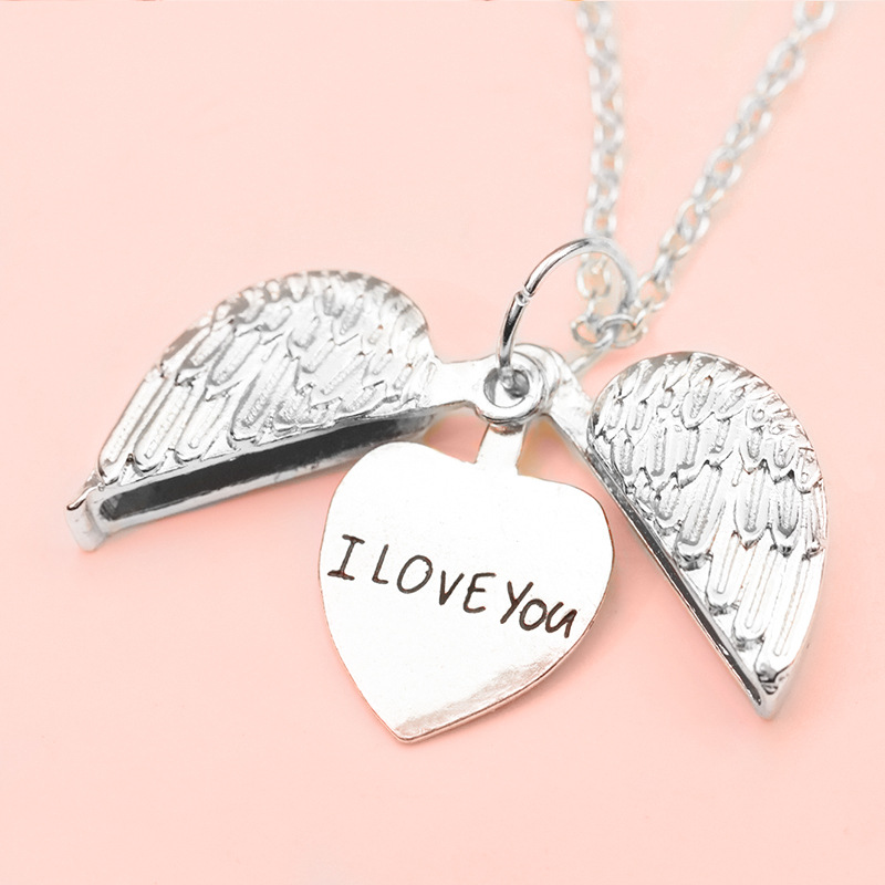 Angel Wings | Message revealing heart pendant