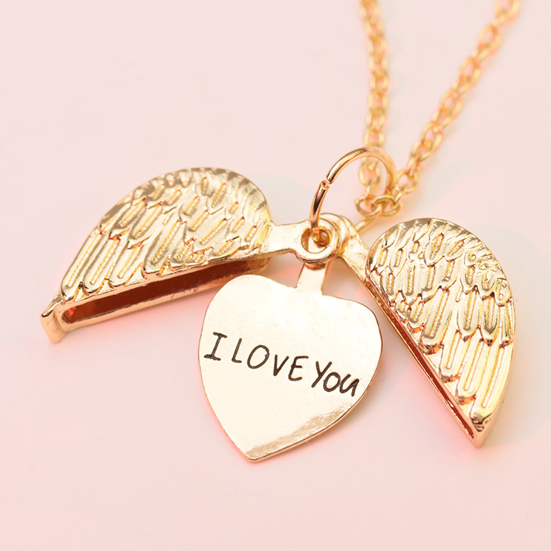 Angel Wings | Message revealing heart pendant